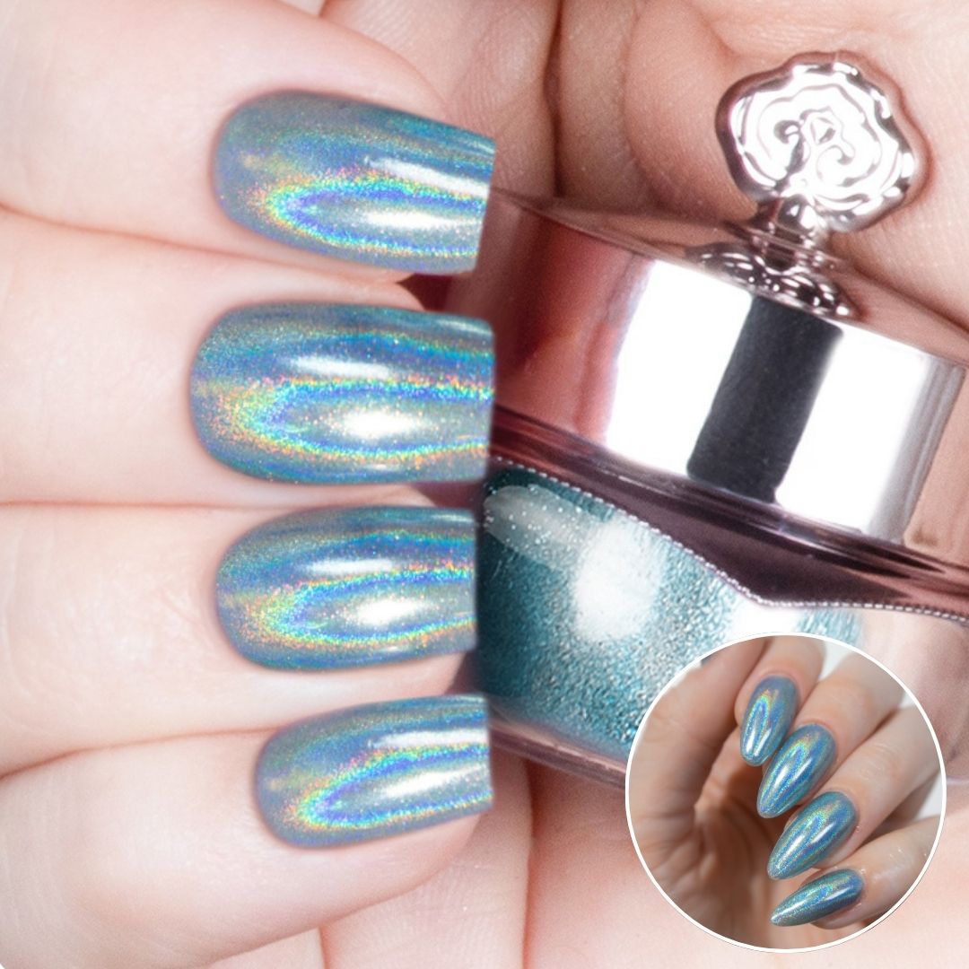Nails featuring a pale, icy blue holographic powder with a delicate shimmer.
