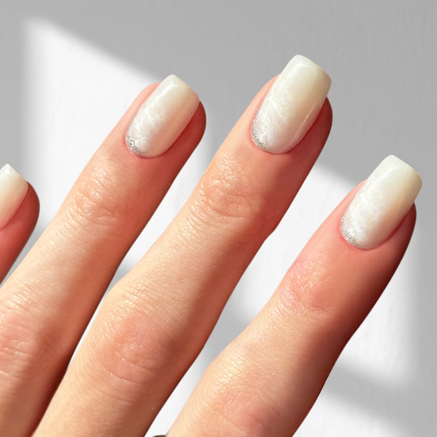 Milkstone - Square Sustainable Nails — tight close-up of the nail design